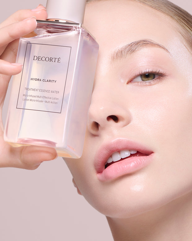 Decorté Cosmetics Kosé J-beauty Skincare Hydra Clarity Treatment Essence Water product with model